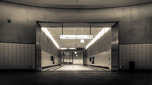 Empty walkway in city