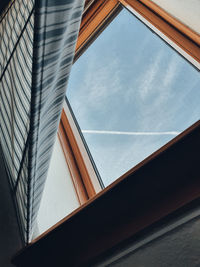 Low angle view of window against sky