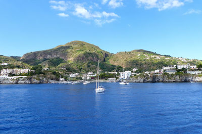 Scenic view of sea against blue sky