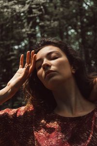 Portrait of woman in forest