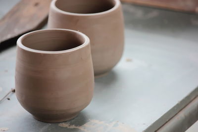 High angle view of coffee cup on table