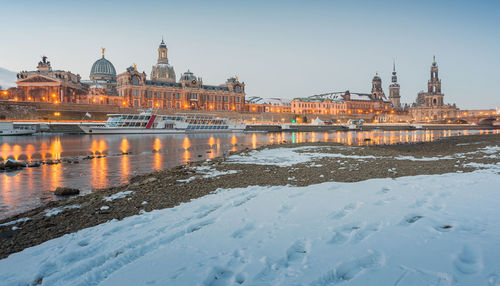 City at waterfront during winter