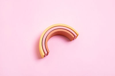 Close-up of banana against pink background