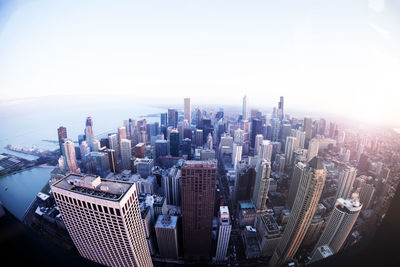 Aerial view of city buildings against sky