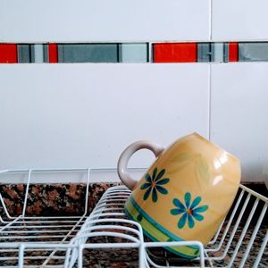 Close-up of drink on table against wall