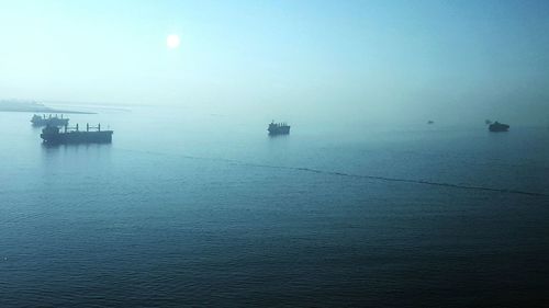 Scenic view of calm sea at sunset