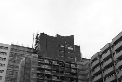 Low angle view of buildings against clear sky