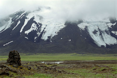 Scenic view of landscape and mountains during winter