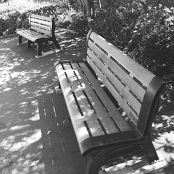 High angle view of empty bench in park