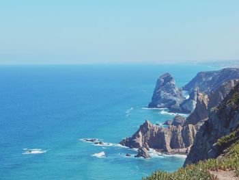 Scenic view of sea against clear sky