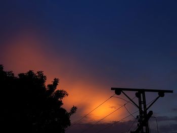 Low angle view of silhouette tree against sky during sunset