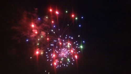 Low angle view of illuminated firework display