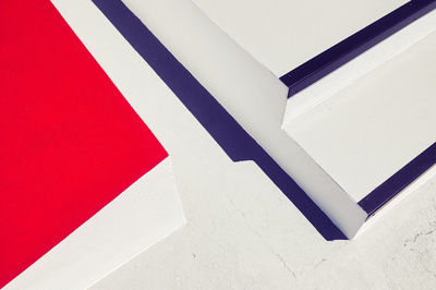 High angle view of arrow symbol on railing