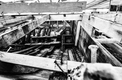 High angle view of abandoned bridge amidst buildings
