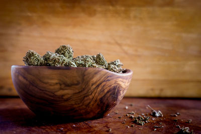 Close-up of dried plant on table