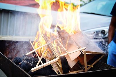 Close-up of burning matchstick