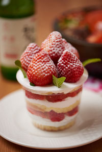 Close-up of strawberries in plate on table