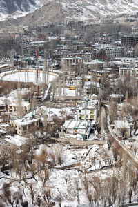High angle view of frozen buildings in city