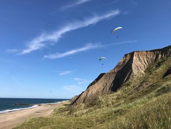 Scenic view of beach against sky