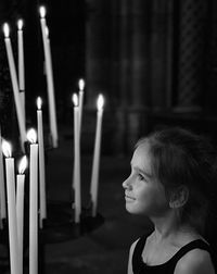 Black and white girl and candles 