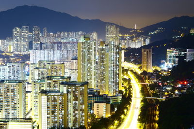 Illuminated buildings in city at night