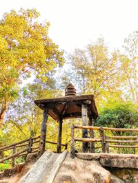 Gazebo in park against sky during autumn