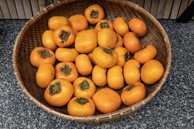 High angle view of fruits in bowl on table