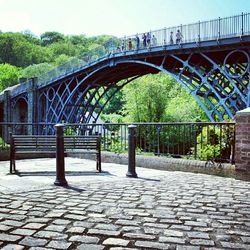 Footbridge with bridge in background