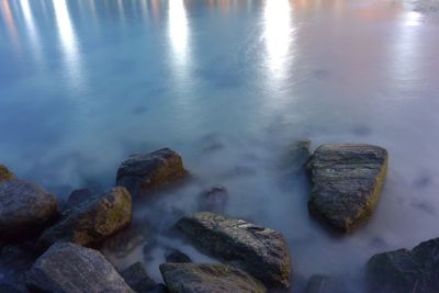 High angle view of rocks in lake