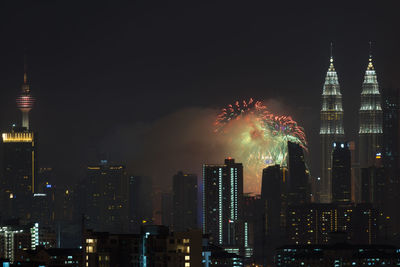 Firework display at night