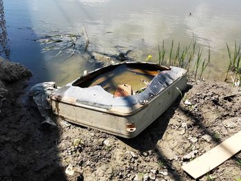 High angle view of abandoned boat on beach