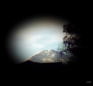 Scenic view of silhouette mountain against sky