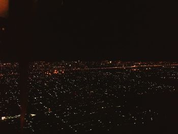 Illuminated cityscape at night