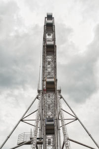 Low angle view of ferris wheel against sky