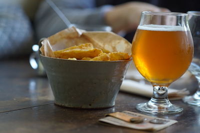 Close-up of beer in glass on table