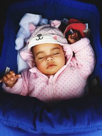 Cute baby sleeping in stroller 