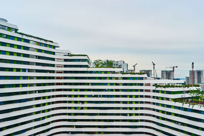 Low angle view of modern building against sky