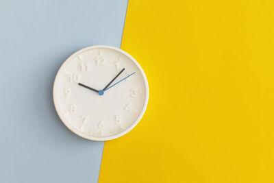 Close-up of clock on wall