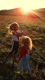 Country life sunset  kids are playing with sunlights