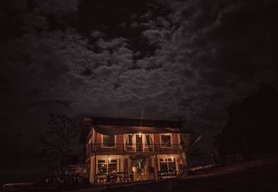 Low angle view of building against sky at night