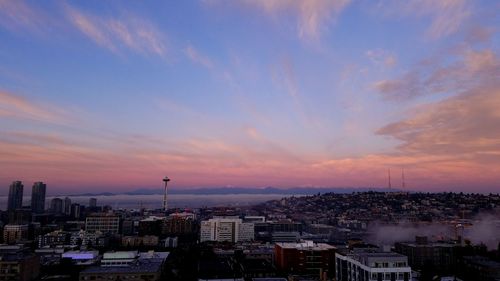 High angle view of city at sunset