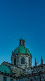 Low angle view of church against clear blue sky