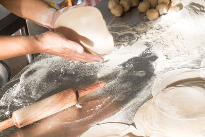 Close-up of man preparing food