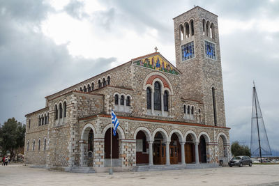 Exterior of historic building against sky in city