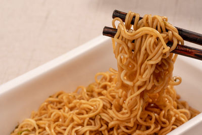 High angle view of noodles in plate on table