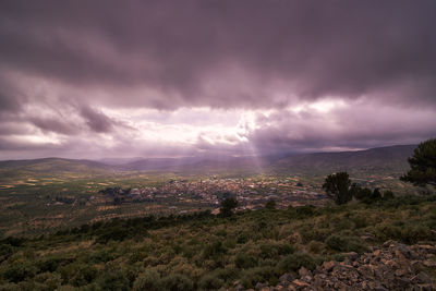 Scenic view of landscape against sky during sunset