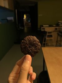 Close-up of hand holding ice cream