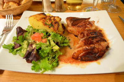 Close-up of served food on table