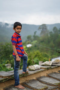 Portrait of a indian pahadi kid who belongs to the mountains.