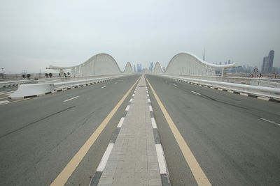 View of bridge over road against sky